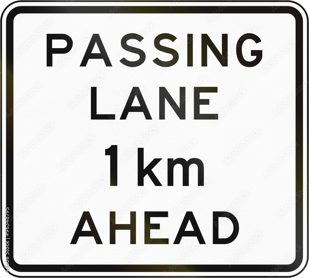 New Zealand road sign - Passing lane ahead in 1 kilometre New Zealand road sign - Passing lane ahead in 1 kilometre