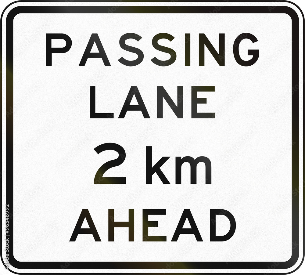 New Zealand road sign - Passing lane ahead in 2 kilometres New Zealand road sign - Passing lane ahead in 2 kilometres
