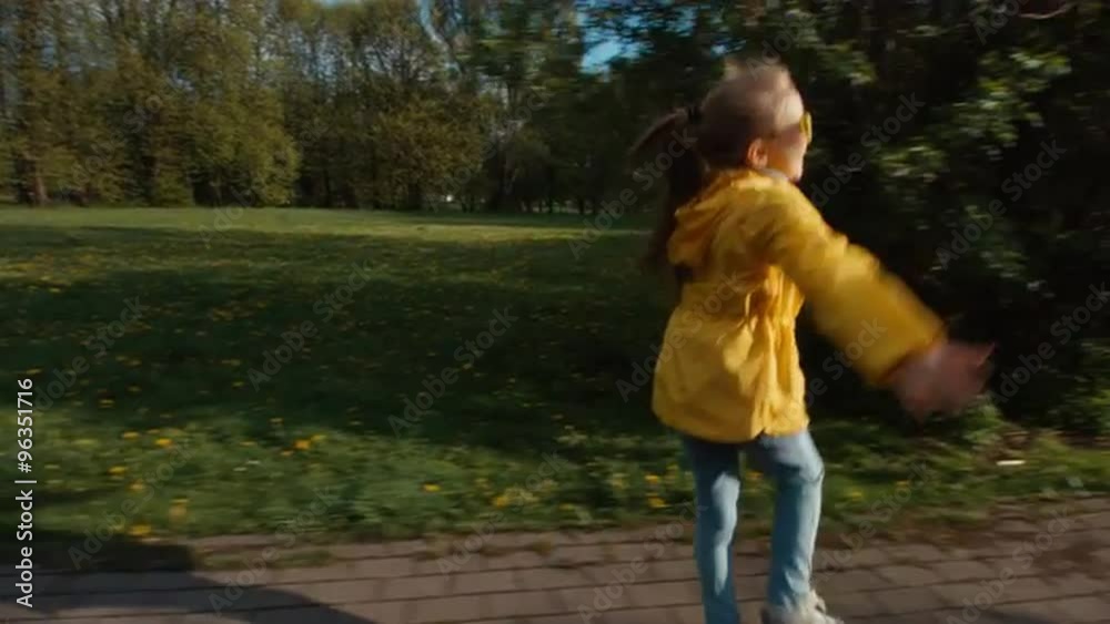 Preschooler girl running in the park Preschooler girl running in the park