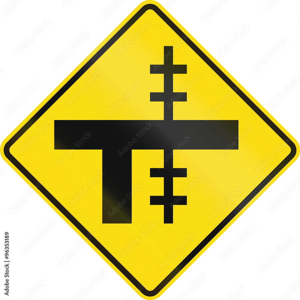 Obraz premium New Zealand road sign - Level crossing on uncontrolled T-junction on right