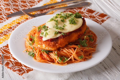 Bilde på lerret Chicken Parmigiana and pasta with tomatoes close-up