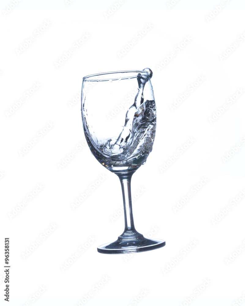 Concept of drinking. Wine glass with splash water on white background Concept of drinking. Wine glass with splash water on white background