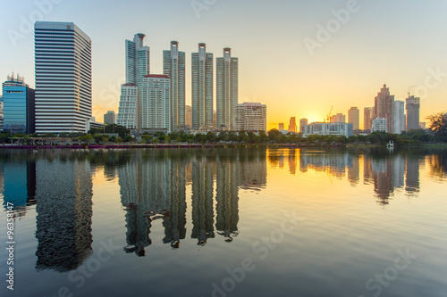 Bangkok city downtown at sunrise with reflection in Bangkok Thailand