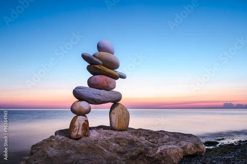 Figurine of Inukshuk of pebbles photo