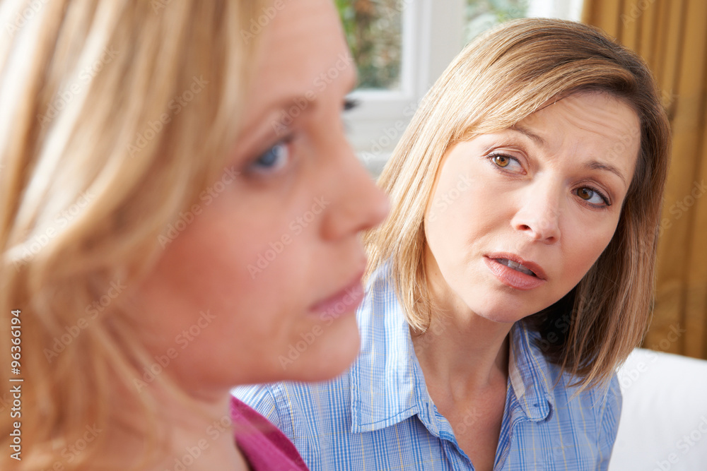 Unhappy Woman In Conversation With Friend Or Counselor