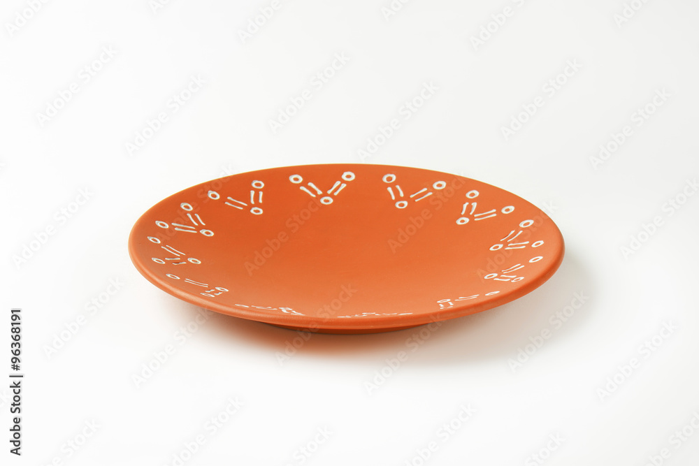 Decorated terracotta dinner plate Decorated terracotta dinner plate