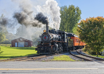 Fotobehang Trein Vintage stoomlocomotief in actie  © Jim Vallee