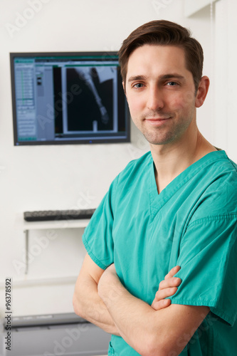 Veterinary Surgeon Standing In Front Of X Ray