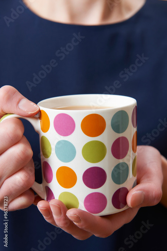 Close Up Of Woman Holding Cup