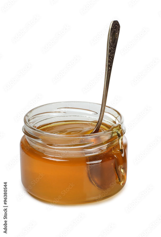 Glass jar with honey on white background Glass jar with honey on white background