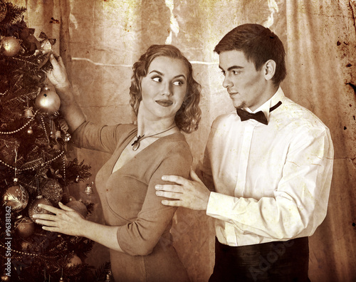 Couple on Christmas party.  Black and white retro. photo