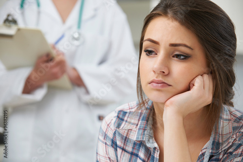 Teenage Girl With Appointment At Doctor s Surgery