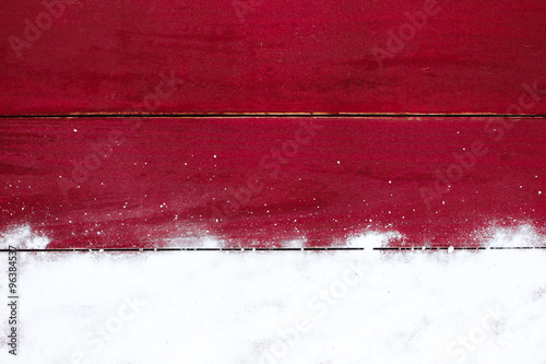 Blank red wood sign with snow border