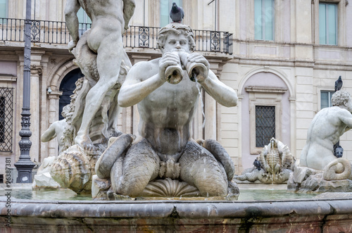 Memorial fountain Moro with marble sculptures in the Piazza Navona in Rome, capital of Italy