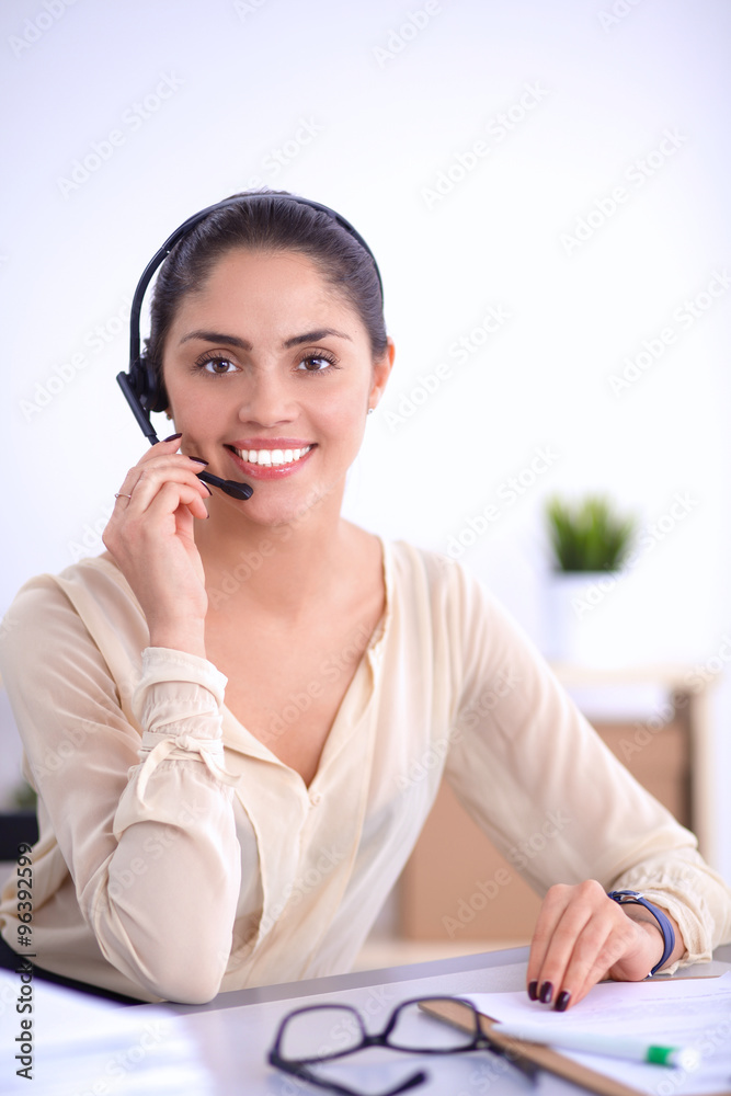 Close-up portrait of a customer service agent sitting at office Close-up portrait of a customer service agent sitting at office