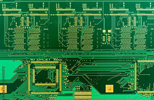 The  blank green printed circuit board (PCB) photo