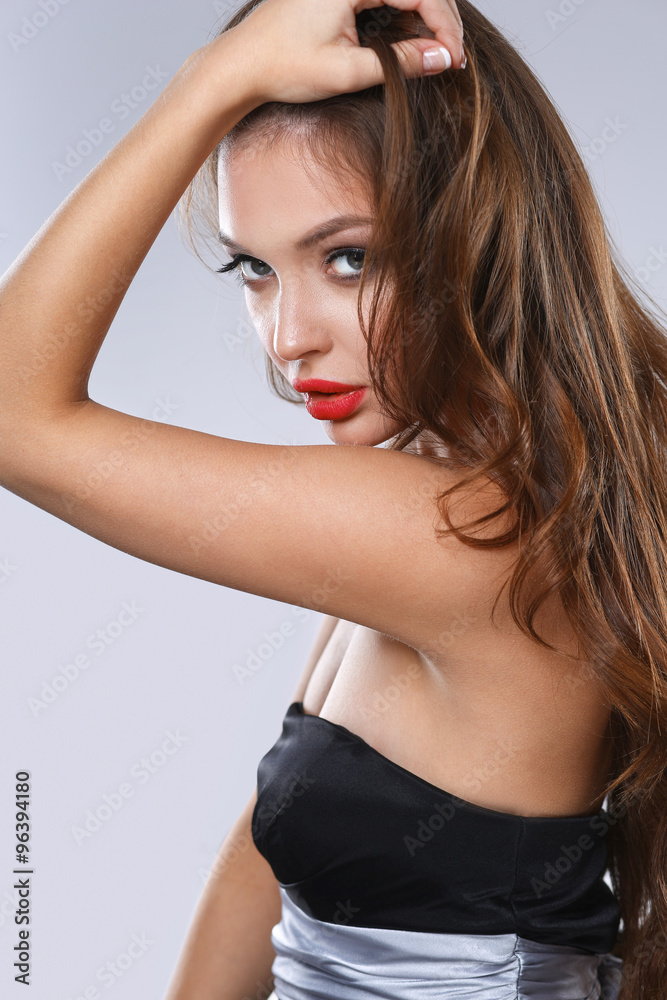 Obraz premium Portrait of beautiful young woman . Isolated on white background