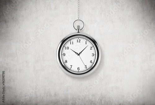 A model of pocket watch which is hanging on the chain. A concept of a value of time in business. Concrete background. 3D rendering.