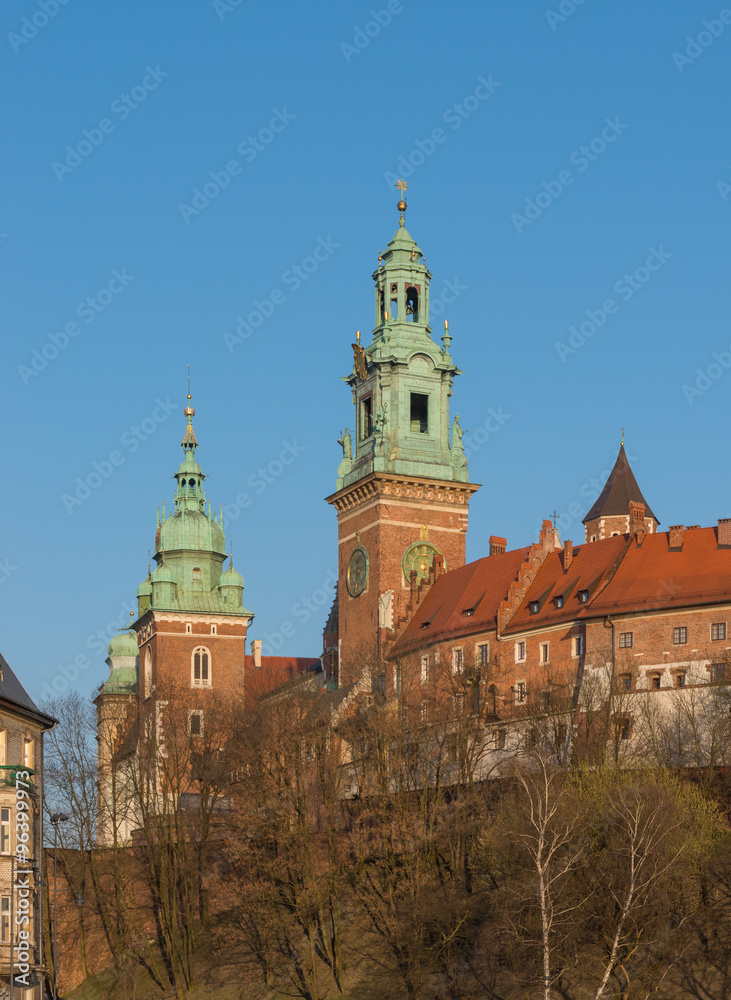 Sigismund, Clock and Silver Bells towers of the St Stanislaw and St Vaclav cathedral on the Wawel Hill with the fortifications of the Wawel castle