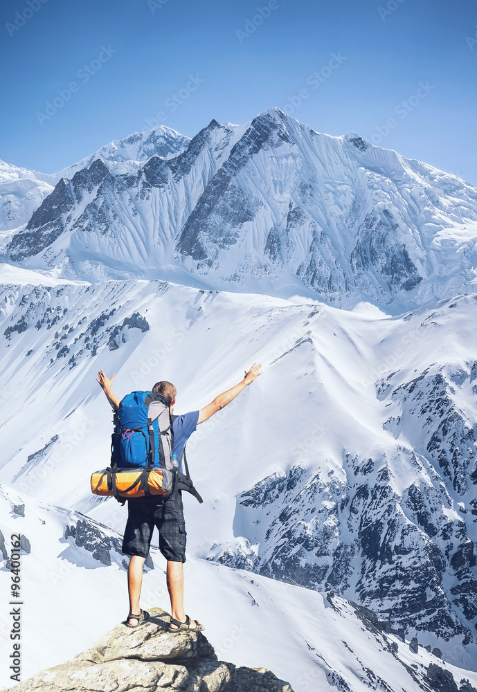 Tourist on mountain peak. Sport and active life concept... Tourist on mountain peak. Sport and active life concept...