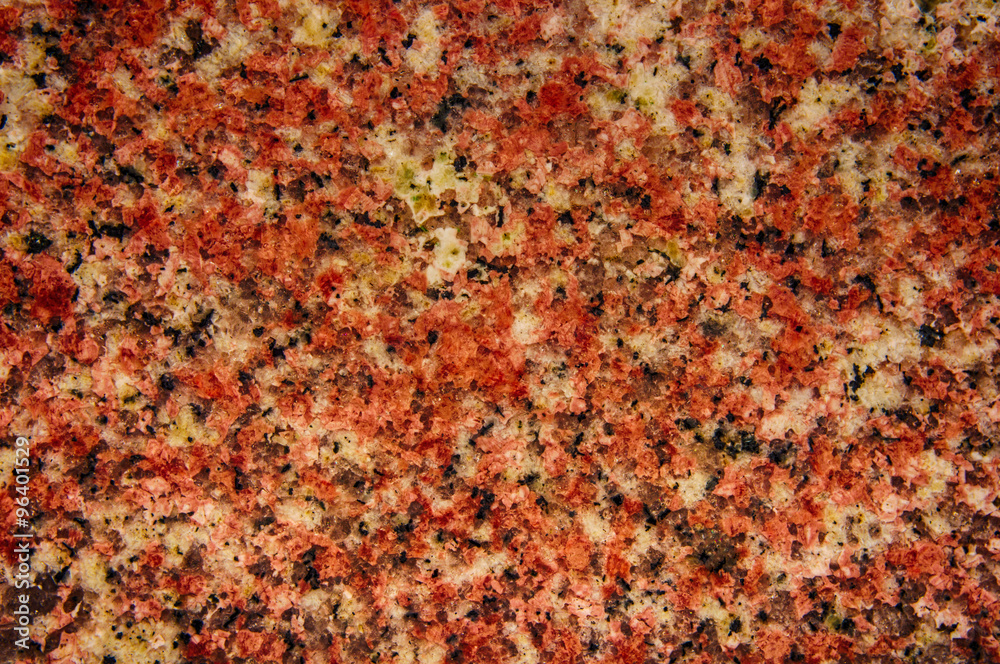 close up of a polished red marbled granite texture close up of a polished red marbled granite texture
