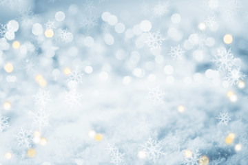 Blue Christmas winter background - snow and bokeh lights
