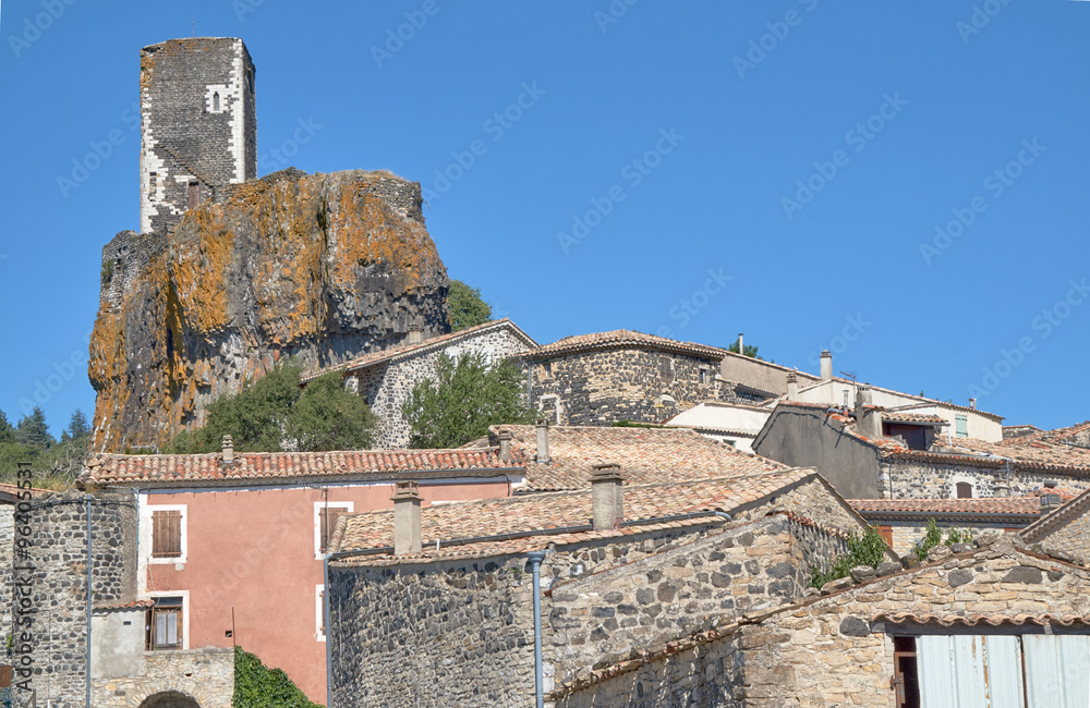 buildings and tower of the medieval town of Mirabel in France.