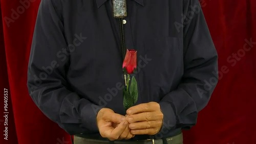 Magician Creates a Rose From Fire photo