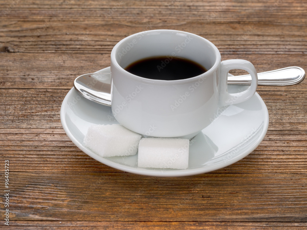 Strong black coffee with sugar, espresso style Strong black coffee with sugar, espresso style