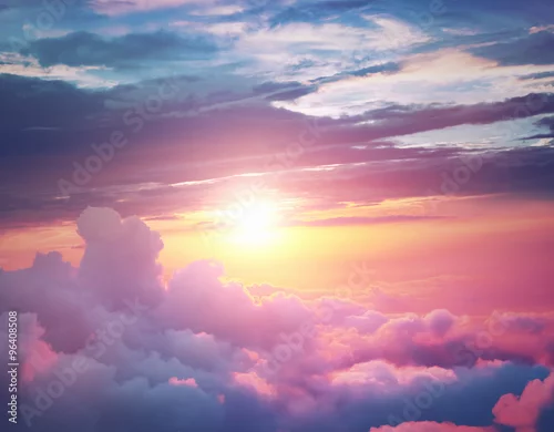 Obraz zachód słońca widziany znad chmur