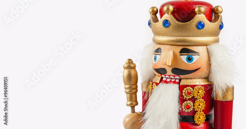 Traditional figurine christmas nutcracker wearing an old military style uniform