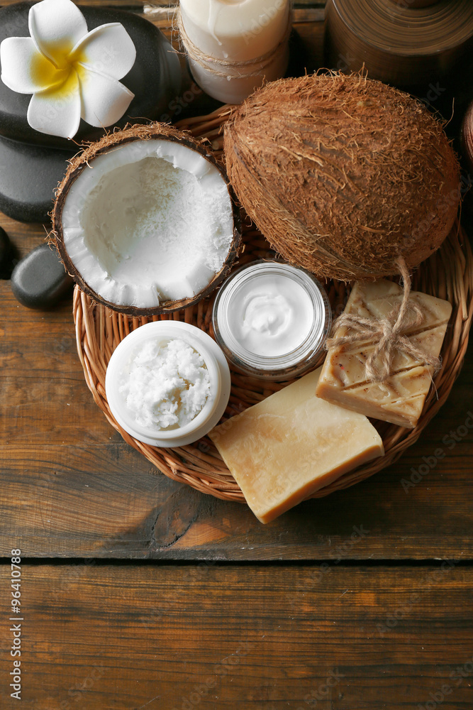 Spa coconut products on dark wooden background Spa coconut products on dark wooden background