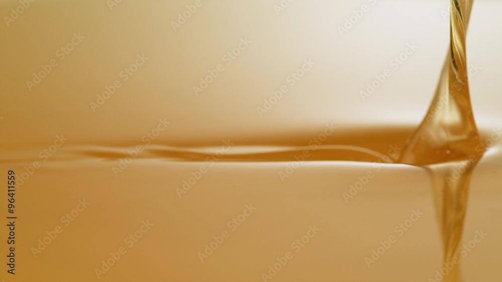 Pouring honey. Shot with high speed camera, phantom flex 4K. Slow Motion.