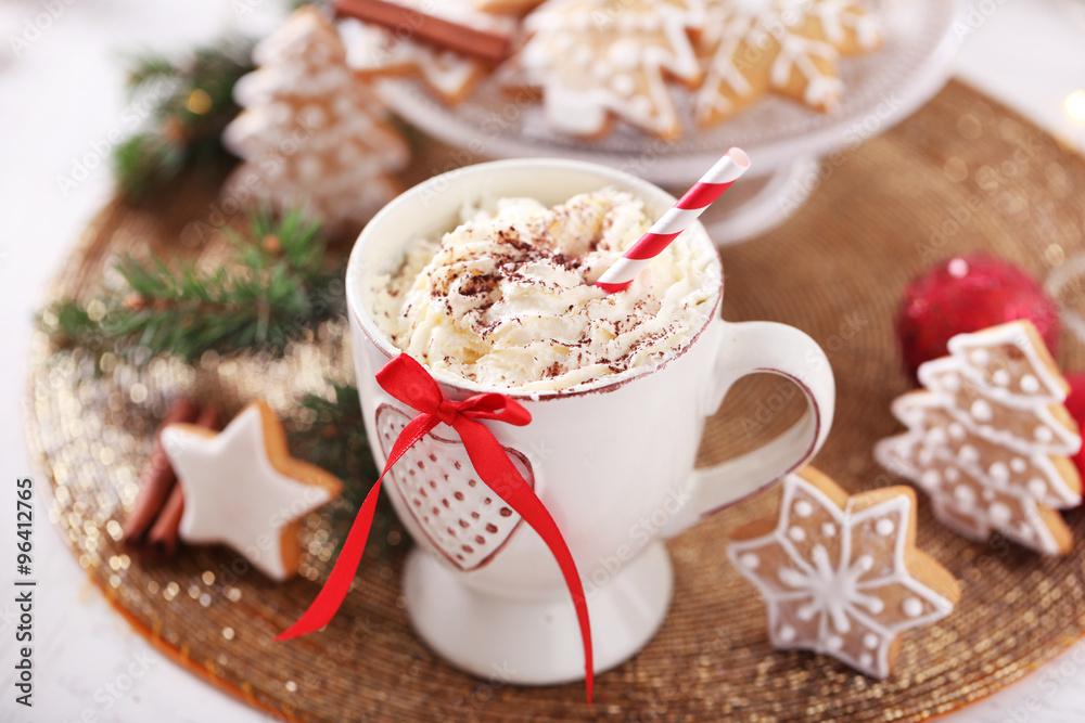 Beautiful composition with cup of cappuccino and Christmas cookies