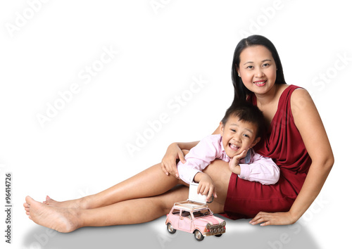 Beautiful Mother And Son playing model toy car