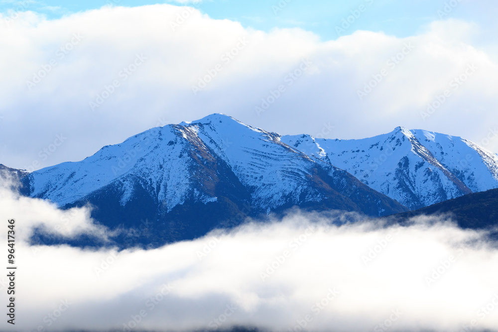 snow mountain peak over te anau lake fiordland national park sou