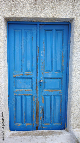 door in small greece village exo gonia on santorini © chriss73