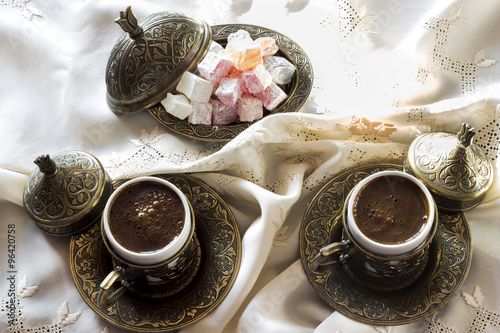 Turkish coffee with delight and traditional copper serving set © sebboy12