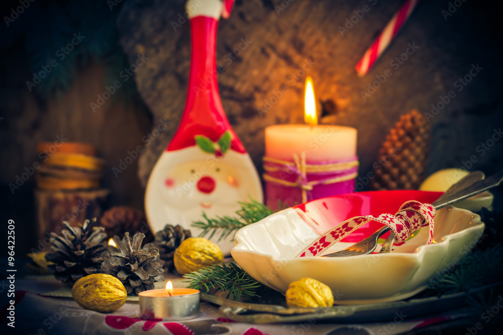 Obraz premium Festively decorated Christmas table tableware candles mood