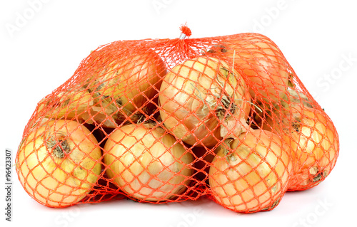 bag of onions isolated on white