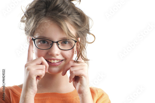 Portrait of a cute girl in glasses for vision..