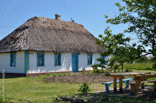 Traditional ukrainian rural cottage with a straw roof, Ukraine #96426935