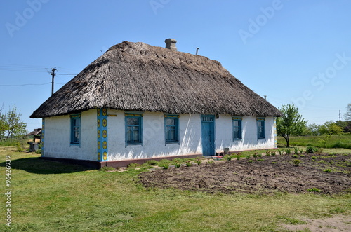 Traditional ukrainian rural cottage with a straw roof, Ukraine