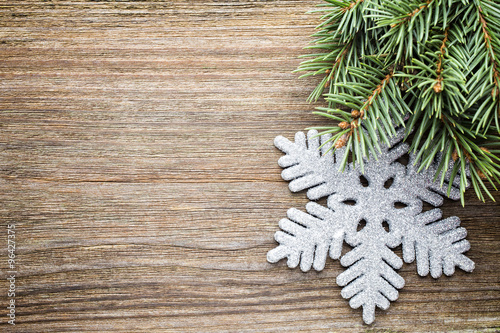 Wood texture with ornament and firtree.