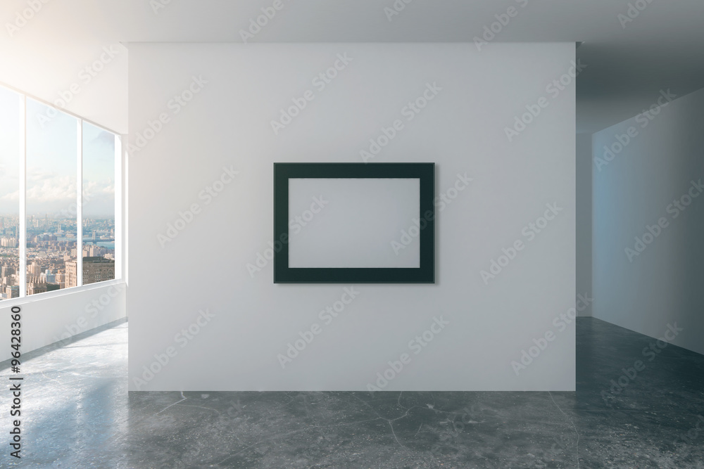 Blank picture frame on white wall in empty loft style room with Blank picture frame on white wall in empty loft style room with