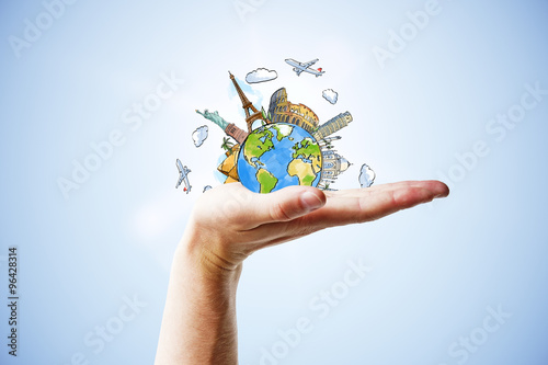 Fototapeta Naklejka Na Ścianę i Meble -  Travel concept with hand and drawn earth planet with landmarks
