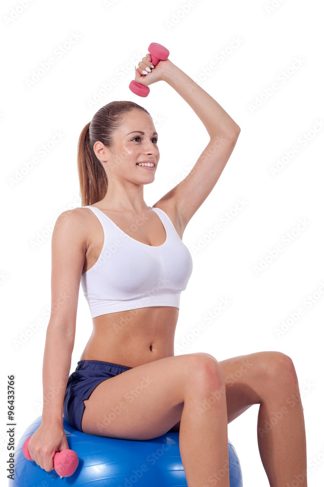 pretty young woman exercising with dumbbells pretty young woman exercising with dumbbells