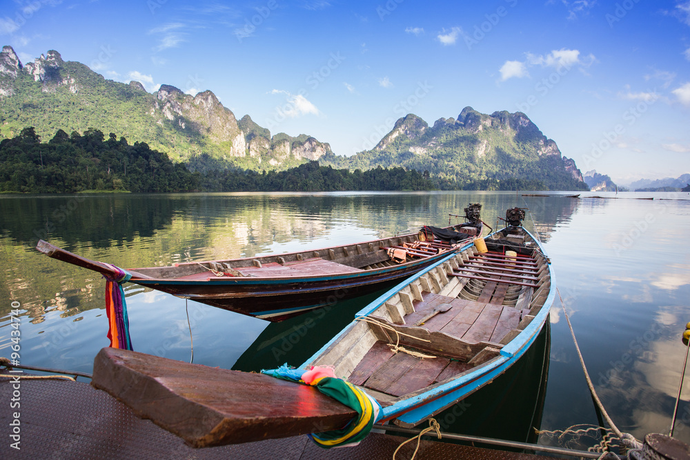 landscape and long-tailed boat in Ratchaprapha Dam at Khao Sok N