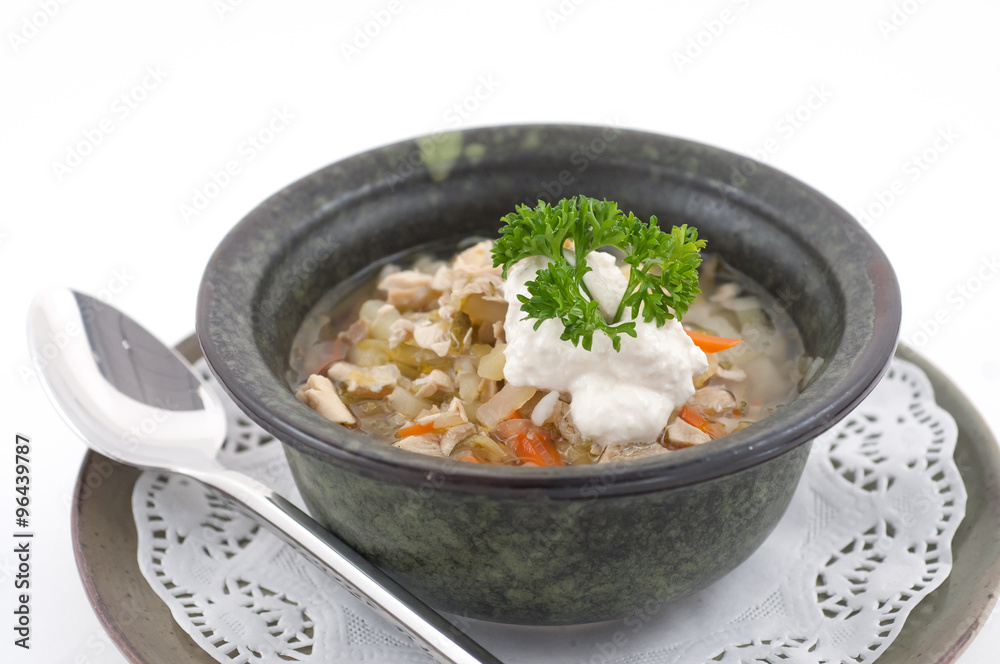Russian traditional soup in a stone bowl isolated on white Russian traditional soup in a stone bowl isolated on white