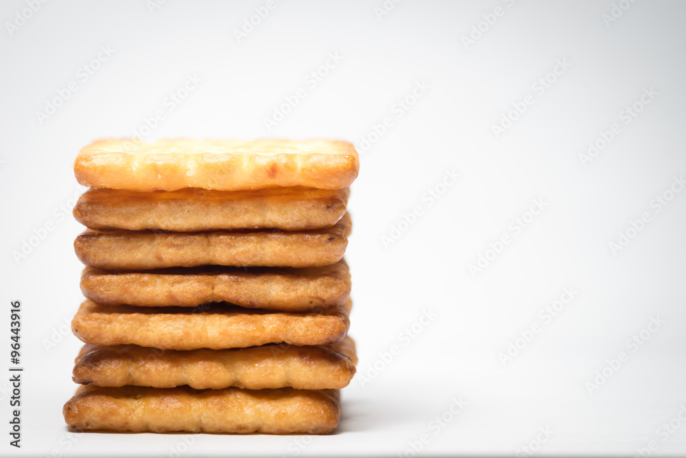Biscuit Stacked on White background with Vignette effect Biscuit Stacked on White background with Vignette effect